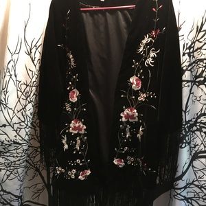Embroidered velvet jacket with fringe